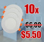 Three round recessed LED slim pot light stacked together to indicate a plurality of the sold item, with orange clips, shown against a blurred kitchen and hallway background with a large red '10x' label indicating that the product is being sold in a 10 pieces pack. A red '$5.50' label indicates the discounted price when purchased in 10s, with a black '$6.00' label being crossed out by a red line indicating its original price.